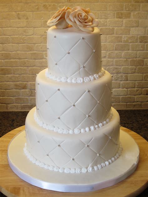 Ivory White Qulited Rose And Silver Pearl Wedding Cake