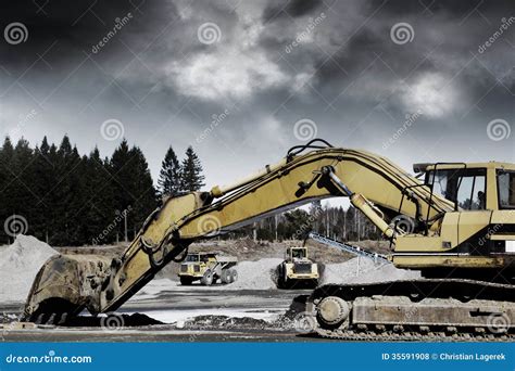 Giant Bulldozers In Action Stock Photo Image Of Industrialmachinery