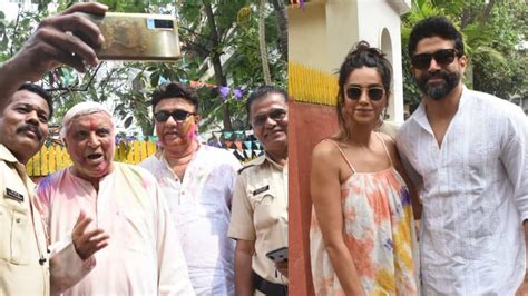 Farhan Akhtar And Shibani Arrive At Holi Party Javed Akhtar Poses With