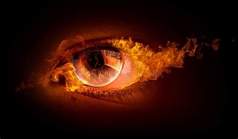 Macro Image Of Human Eye With Fire Flames Mixed Media Stock Image