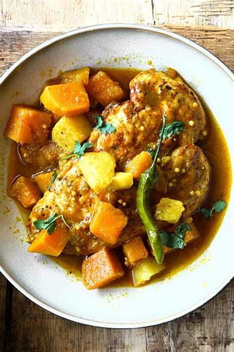 Indian Spiced Chicken With Sweet Potatoes Serving Dumplings