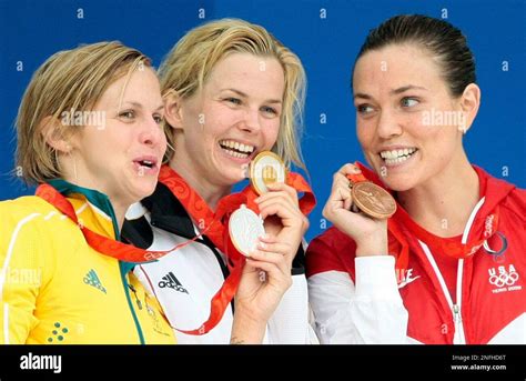 Germany S Gold Medal Winner Britta Steffen Center Is Flanked By