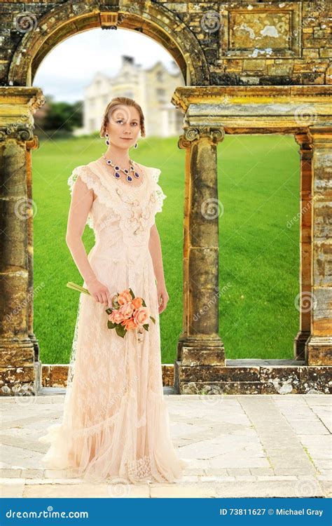 Victorian Woman In Garden By Stone Arch Stock Image Image Of Elegant