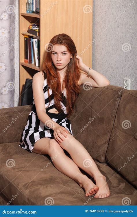 Teen Redhead Sits And Telegraph