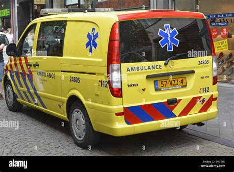 Dutch Street Scene Mercedes Ambulance Parked Outside Shops Maastricht