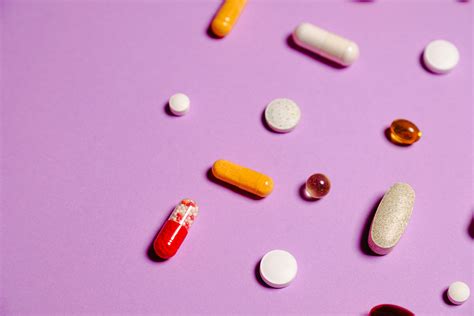 red  white medication pills  stock photo