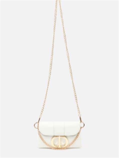 Buy Carlton London White Structured Sling Bag With Quilted Handbags