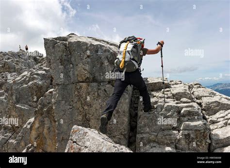 France Haute Savoie Aravis La Clusaz Hiker Reaching The Summit Of