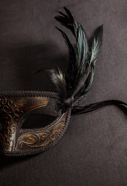 Premium Photo Carnival Venetian Mask With Feathers On Black Color