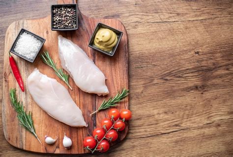 Premium Photo Raw Chicken Fillet On Wooden Background