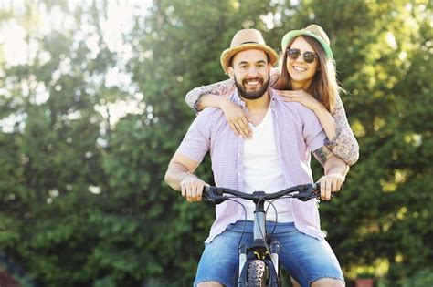 Premium Photo Romantic Couple Riding Bikes