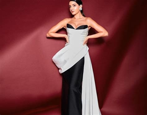 Nora Fatehi Flaunts Hot Figure In Black Gown With White Corset Bodice See Sexy Pics