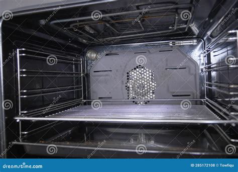 Open electric oven at home stock photo. Image of dishware - 285172108