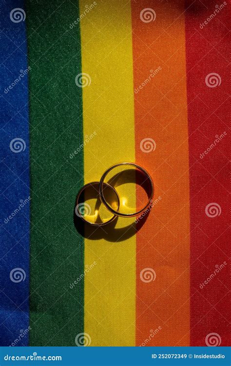 Legalization Of Same Sex Marriages Rainbow Flag And Wedding Rings