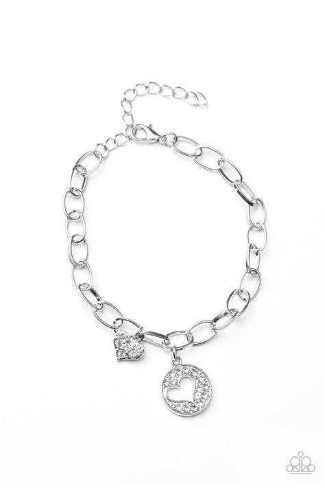 Featuring An Airy Heart Cutout A Glittery White Rhinestone Encrusted