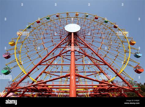 Ferris Wheel Against A Clear Blue Sky Stock Photo Alamy