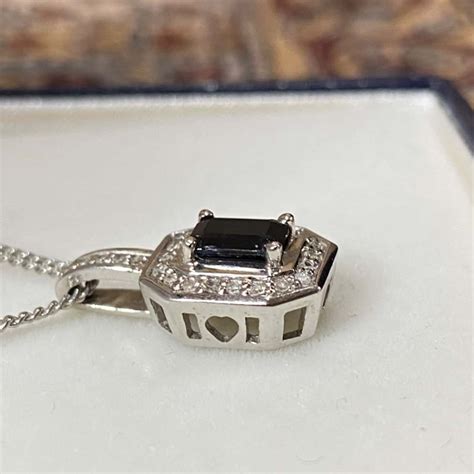 Prouds 9k White Gold Pendant Diamond And Sapphire Necklaces Pendant