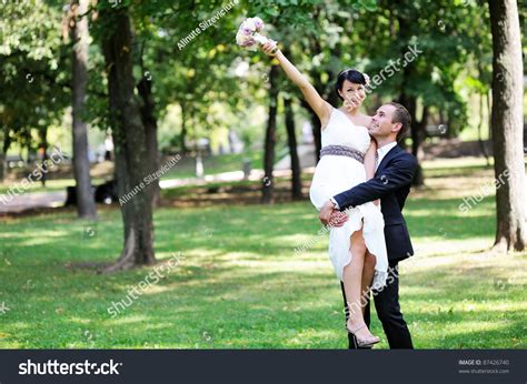 Happy Groom Holding Bride His Arms Stock Photo 87426740 Shutterstock