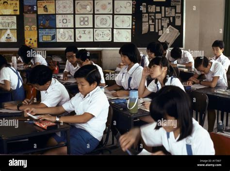 PRIMARY SCHOOL CLASSROOM SINGAPORE.Pupils working at their desks Stock ...