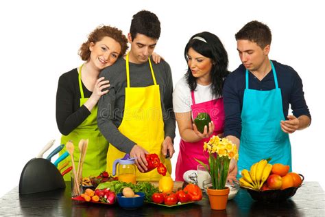 Pares Felices Que Cocinan Junto Imagen De Archivo Imagen De Cuatro