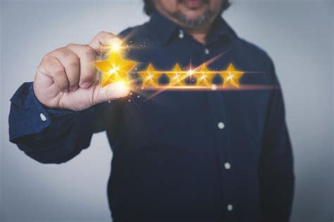 Premium Photo Businessman Holding Five Stars On Hand Man Giving