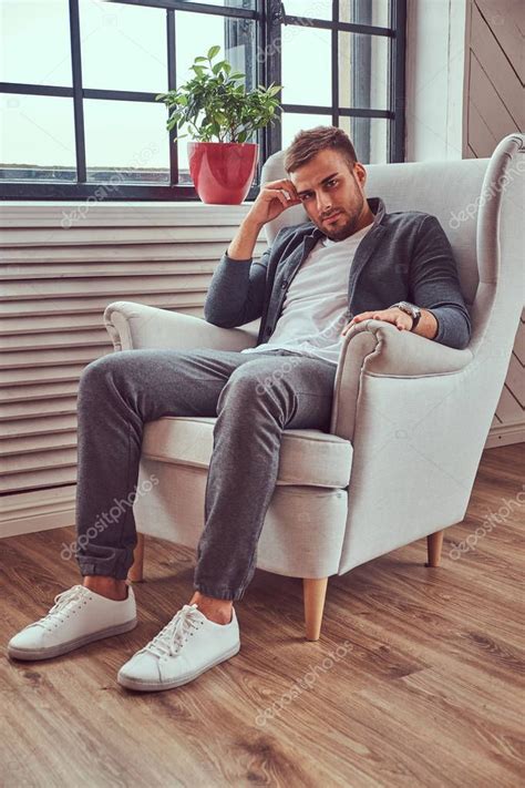 Handsome Young Guy Casual Clothes Relaxing While Sitting Chair Stock