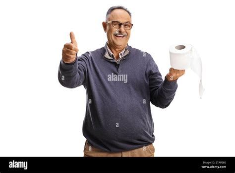 Smiling Mature Man Holding A Toilet Paper Roll And Gesturing Thumbs Up