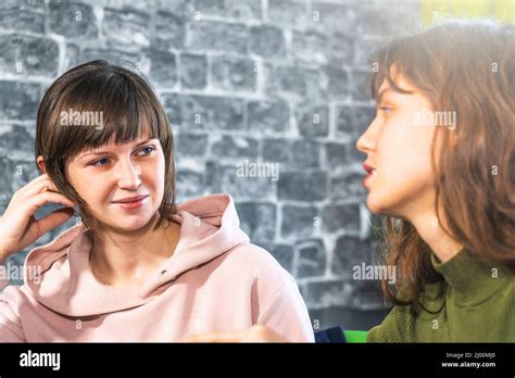 Two Women Friends Gossiping Hi Res Stock Photography And Images Alamy