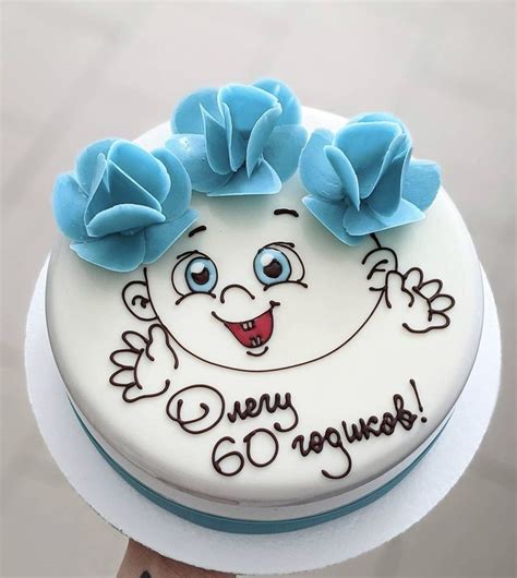 A White Cake With Blue Flowers On Top