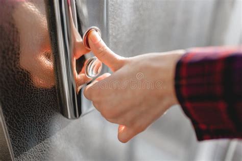 The Thumb Presses The Elevator Button A Hand Reaching For The Button The Girl Waiting For