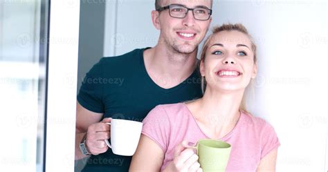 young couple enjoying morning coffee 11256698 Stock Photo at Vecteezy