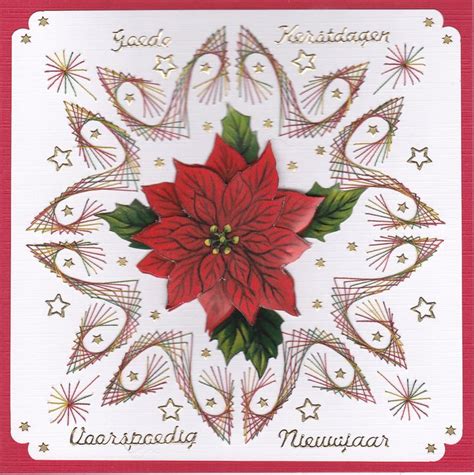 A Christmas Card With A Poinsettia And Stars In The Center On A White