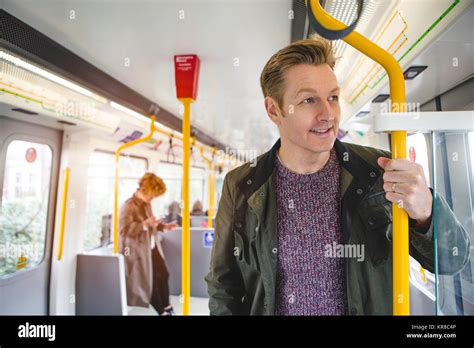 Commuting on the train Stock Photo - Alamy