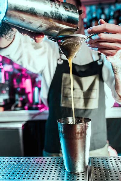 Expert Barman Is Making Cocktail At Night Club Stock Image Everypixel