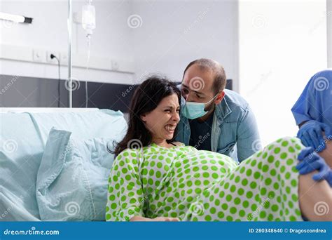 Pregnant Woman Pushing And Screaming Stock Photo Image Of Care Hand