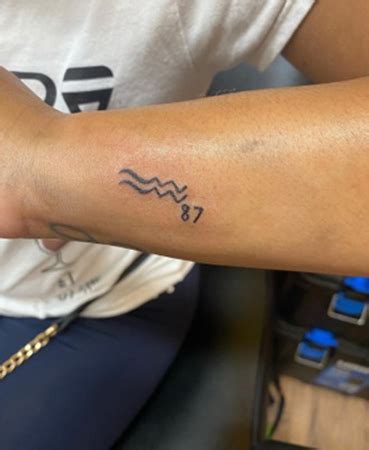 Share 75 Aquarius Symbol Tattoo Latest Vova Edu Vn