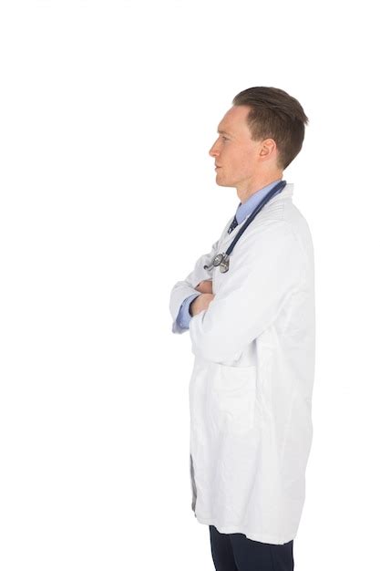 Premium Photo Serious Doctor With Arms Crossed