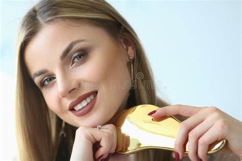 Beautiful Blonde Smiles And Combs Long Hair Stock Image Image Of Girl Healthy