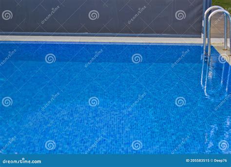 Blue Swimming Pool in a Resort Stock Image - Image of leisure, hotel ...