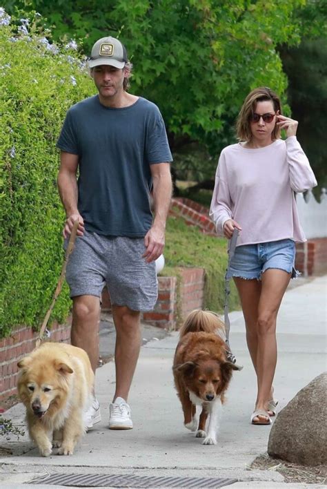 Aubrey Plaza In A Blue Daisy Duke Shorts Walks Her Dogs Out With Jeff