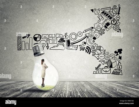 Businesswoman Trapped In Bulb Stock Photo Alamy
