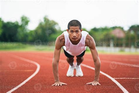 Athletes Sport Man Runner Wearing White Sportswear To Push Up