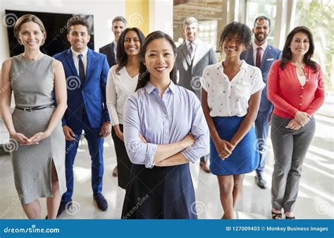 Asian Businesswoman And Her Business Team Group Portrait Stock Image