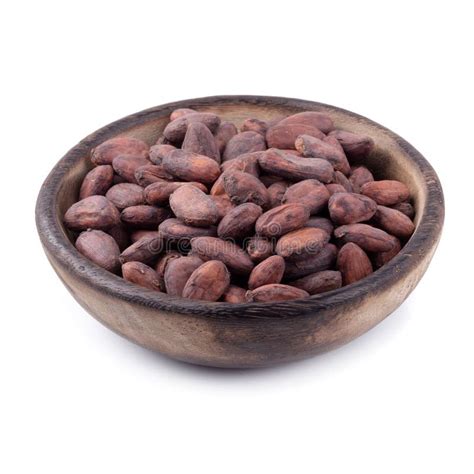 Cocoa Fruit In A Wooden Bowl Raw Cacao Beans Isolated On A Whit Stock