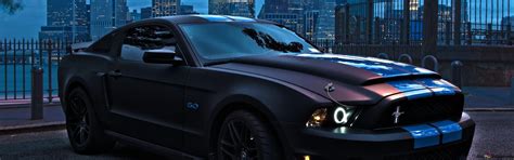 Parked Ford Mustang at night city view HD wallpaper download