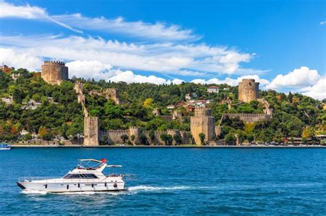 Premium Photo The Ship Sails In The Bosphorus Strait By Rumeli Hisari