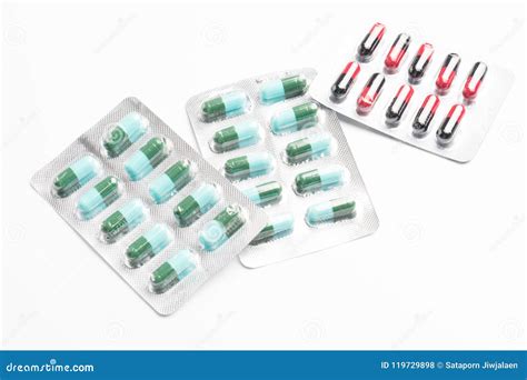 Selective Focus Of Antibiotic Capsules Pills On Blur Background Stock