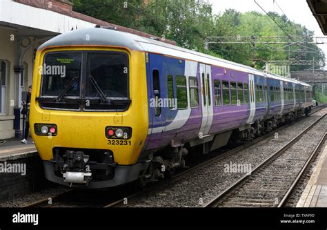 British Rail Class 323 Electric Multiple Unit Train At Alderley Edge Railway Station Alderley