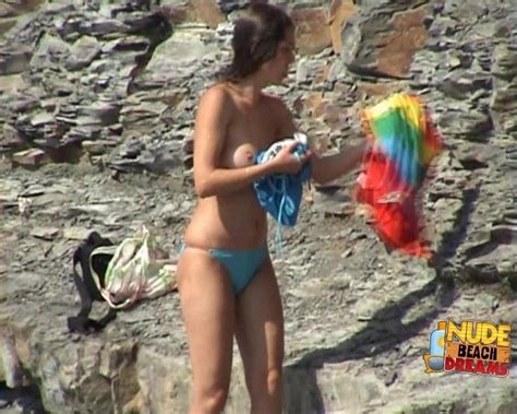 Busty Brunette Takes Her Sexy Blue Bikini Off