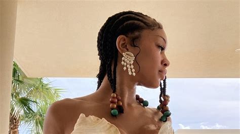 Saweetie Goes Topless As She Flaunts Curves In Skimpy Green Bikini During Tropical Getaway